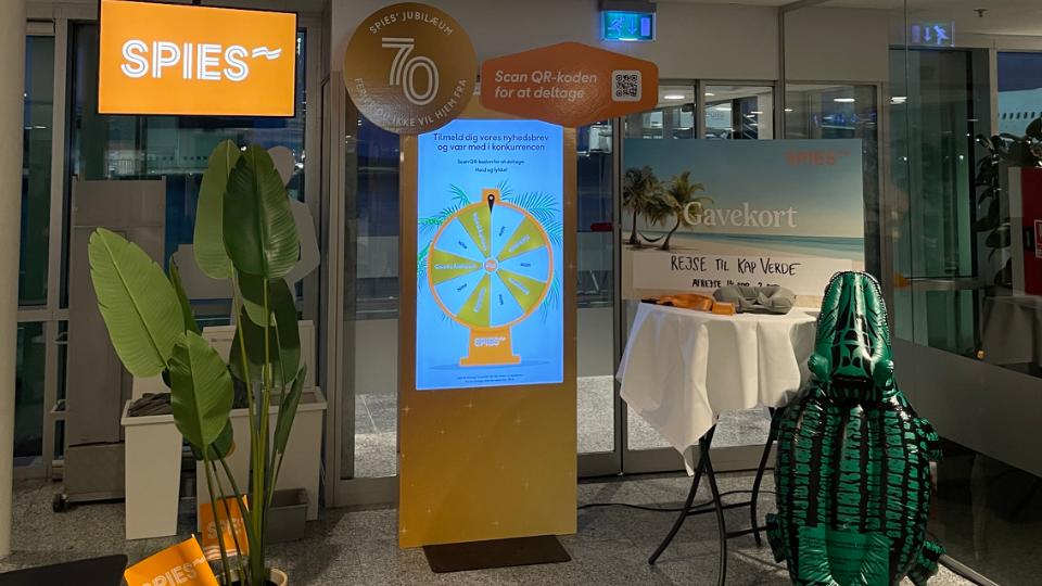 Spin lykkehjulet og vind ferierelaterede præmier hos Spies